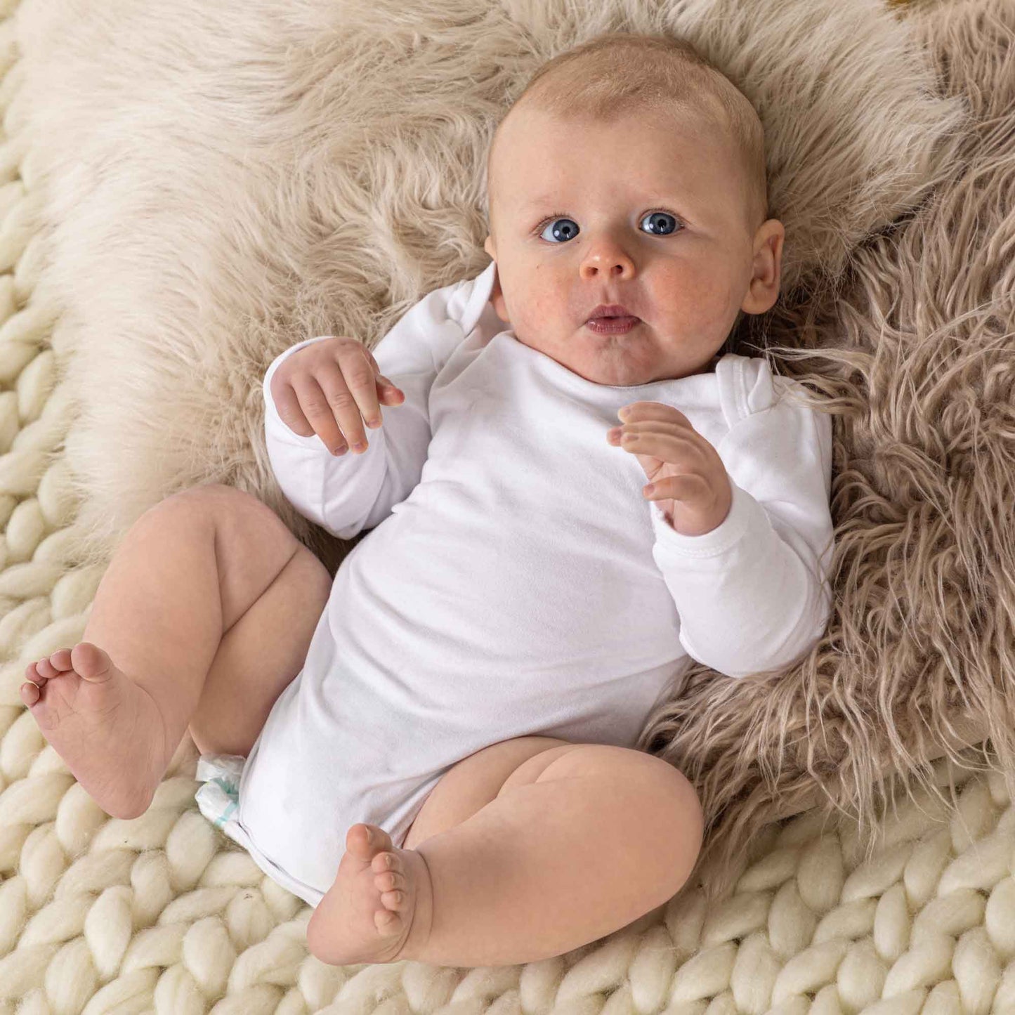 Longsleeve white baby bodysuit vest
