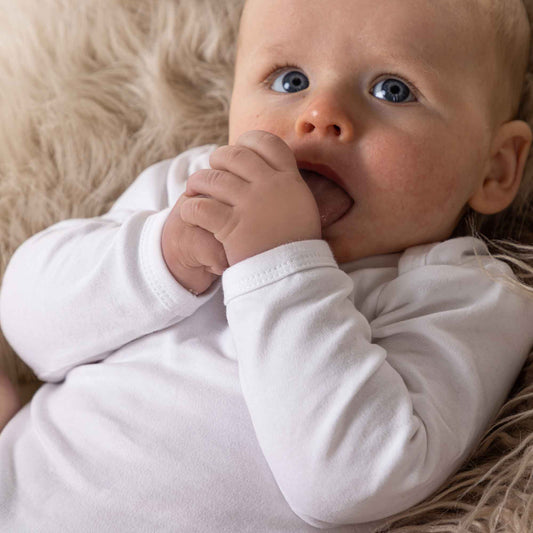 Longsleeve white baby bodysuit vest