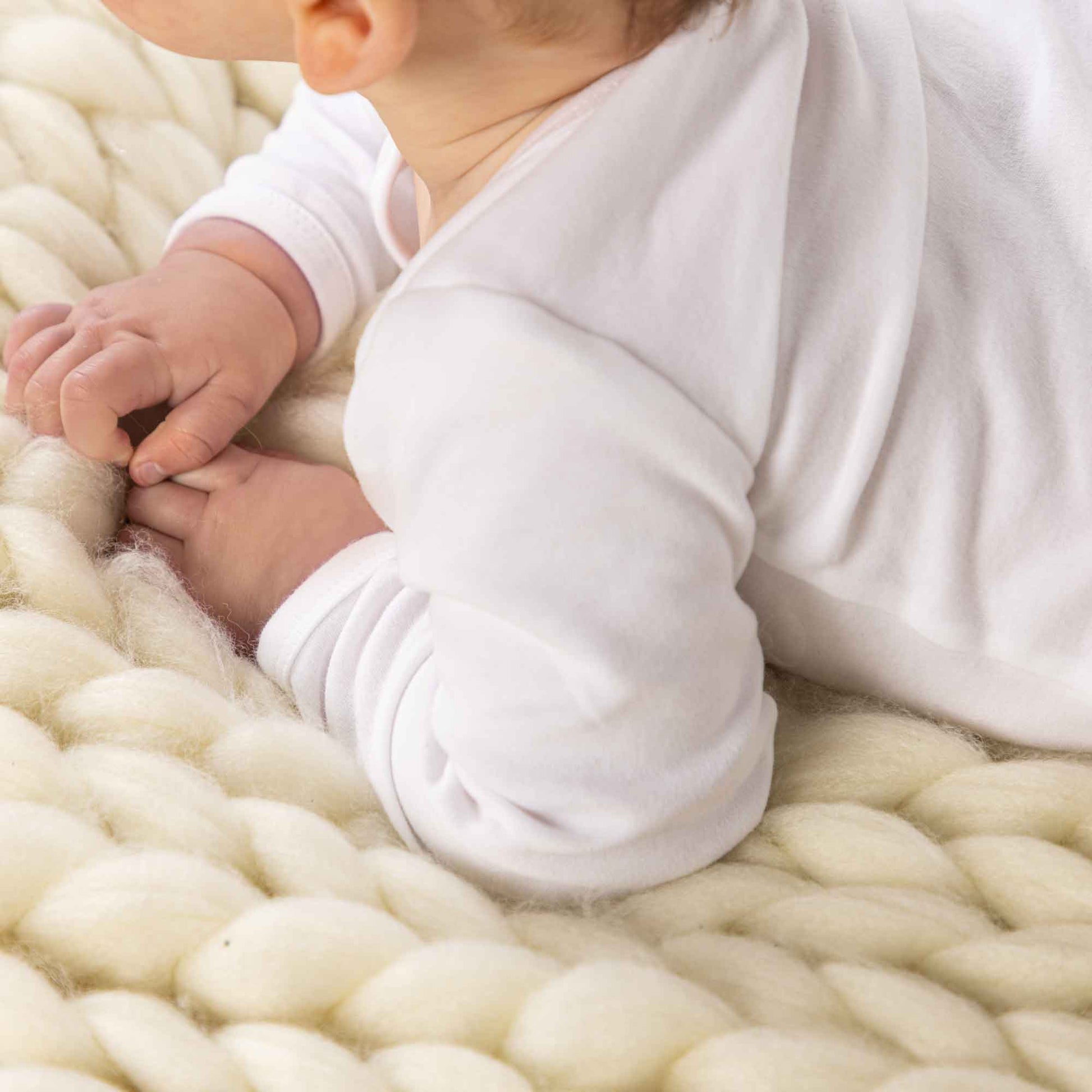 Longsleeve white baby bodysuit vest